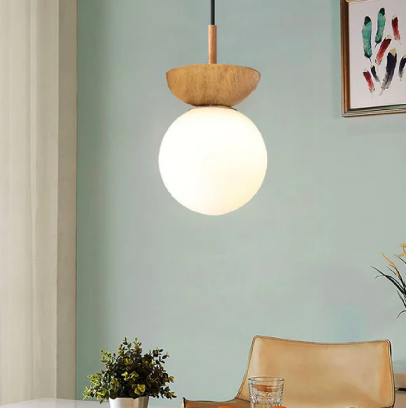 A ceiling or pendant lamp with a frosted shade and a wooden accent – minimalist elegance for any interior 8