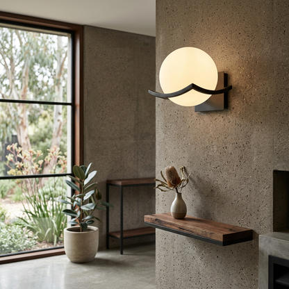 Curved Metal Arm Glass Globe Sconce