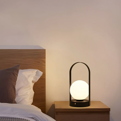 LED table lamp with a spherical shade – a modern decorative lamp with a button 4