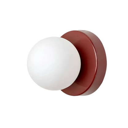 A modern wall sconce with a spherical shade – a minimalist design for interiors 5