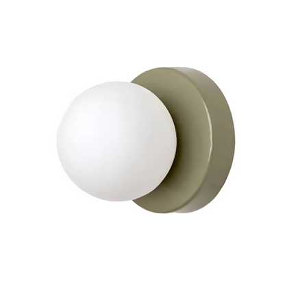 A modern wall sconce with a spherical shade – a minimalist design for interiors 6