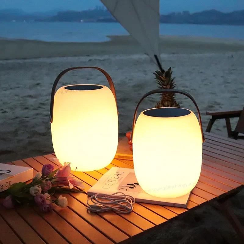 Portable LED lamp with handle – a wireless decorative lamp for interiors and gardens 0