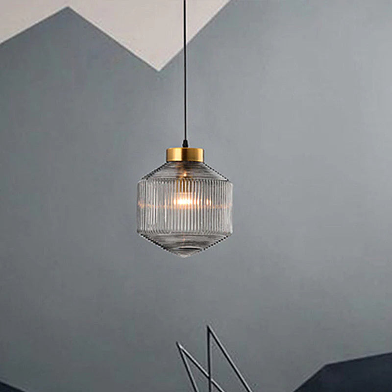 An elegant glass pendant lamp with a grooved shade 9