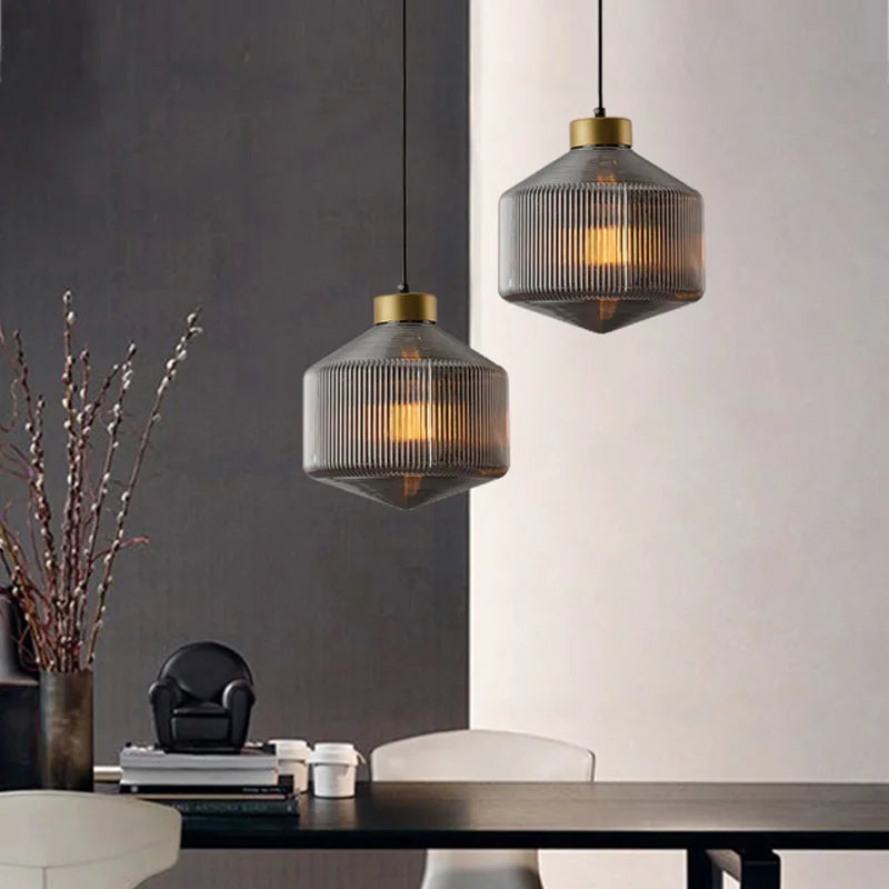 An elegant glass pendant lamp with a grooved shade 1