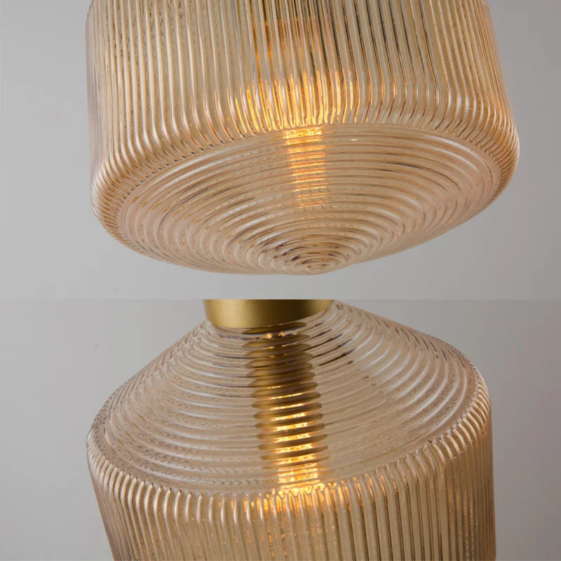 An elegant glass pendant lamp with a grooved shade 5