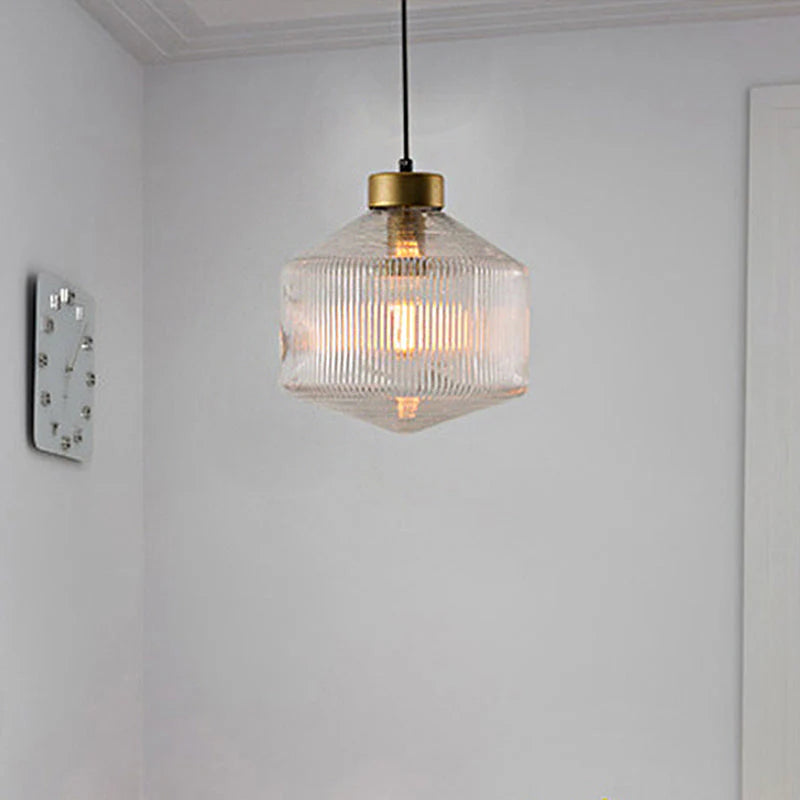 An elegant glass pendant lamp with a grooved shade 6