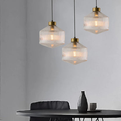 An elegant glass pendant lamp with a grooved shade 7