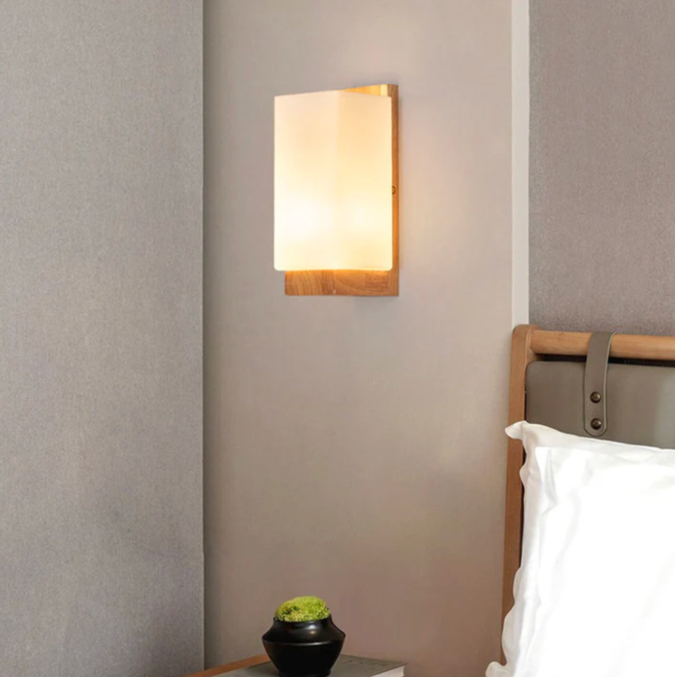 Wooden wall sconce with a frosted shade – a modern lamp for the bedroom 0