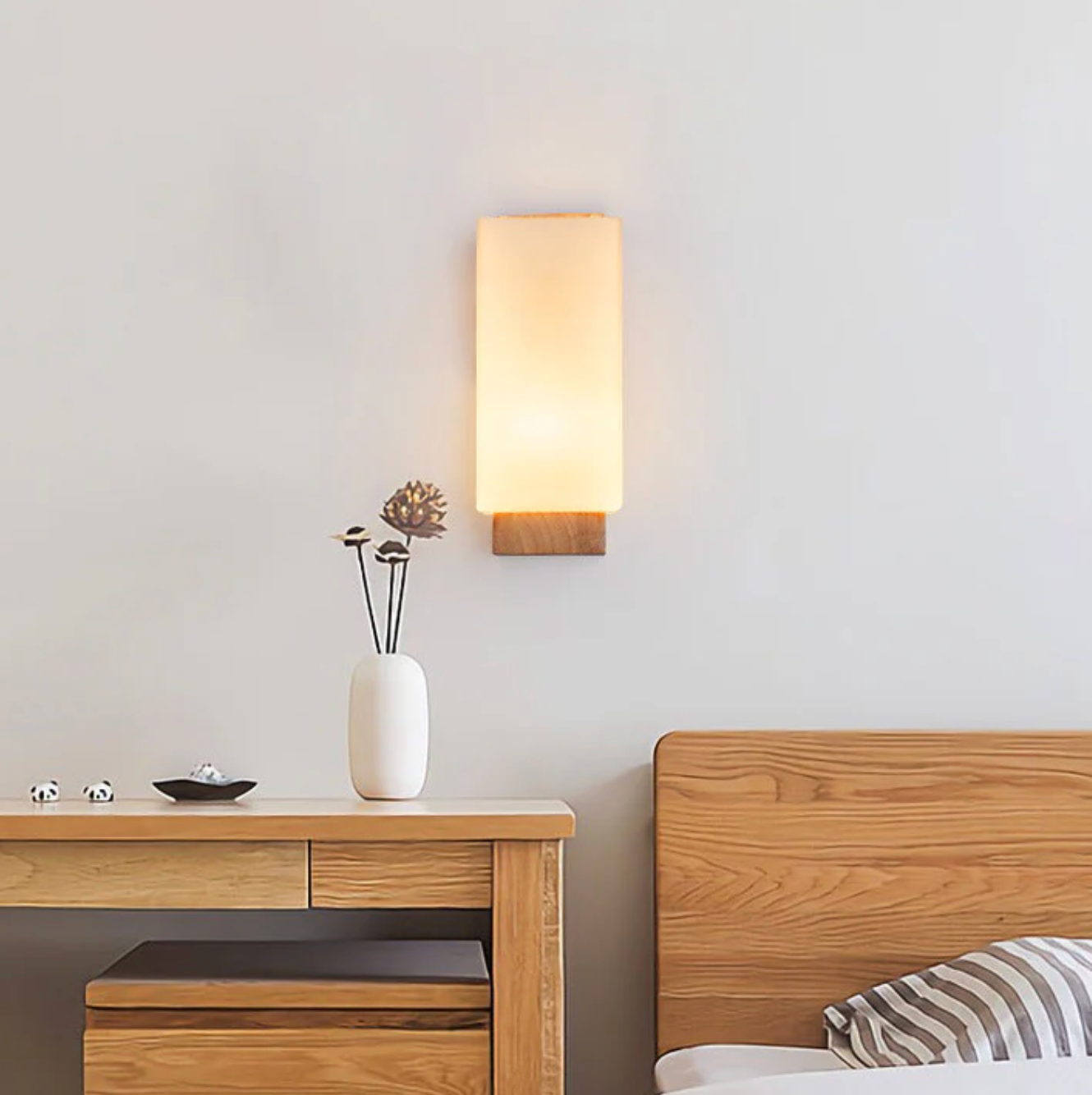 Wooden wall sconce with a frosted shade – a modern lamp for the bedroom 5