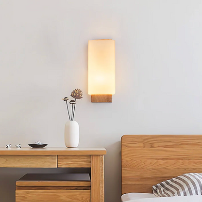 Wooden wall sconce with a frosted shade – a modern lamp for the bedroom 5