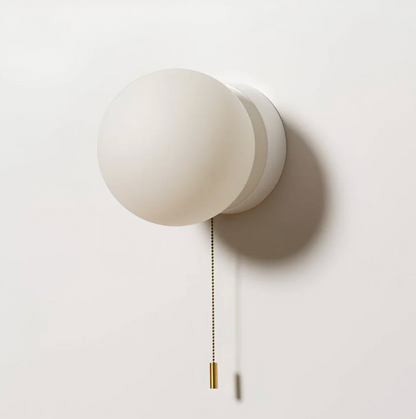 Wall sconce with a spherical shade and chain – modern elegance in a minimalist form 8