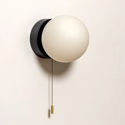 Wall sconce with a spherical shade and chain – modern elegance in a minimalist form 0