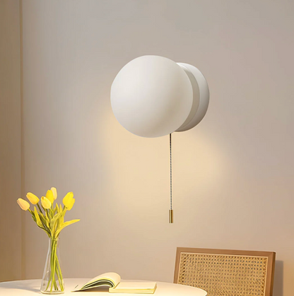 Wall sconce with a spherical shade and chain – modern elegance in a minimalist form 7