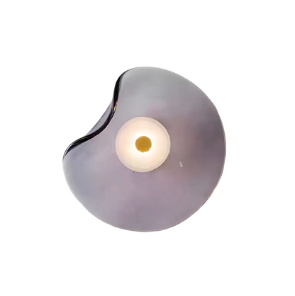 Designer LED wall sconce – a modern lamp with an artistic shade 9