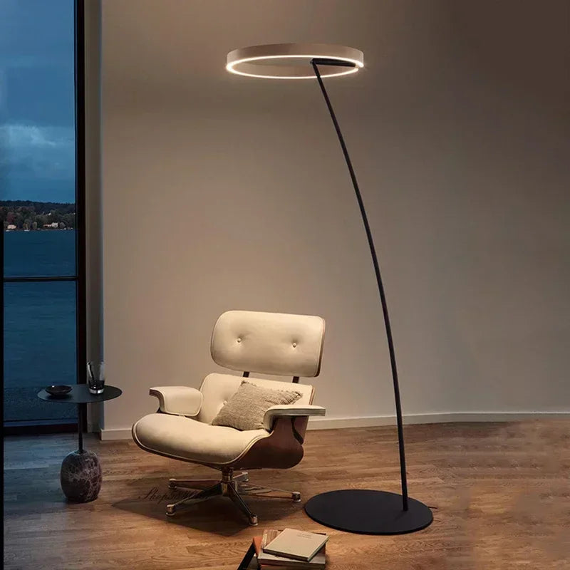 A modern LED floor lamp with a round ring-shaped lampshade 0