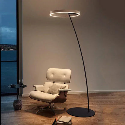 A modern LED floor lamp with a round ring-shaped lampshade 0