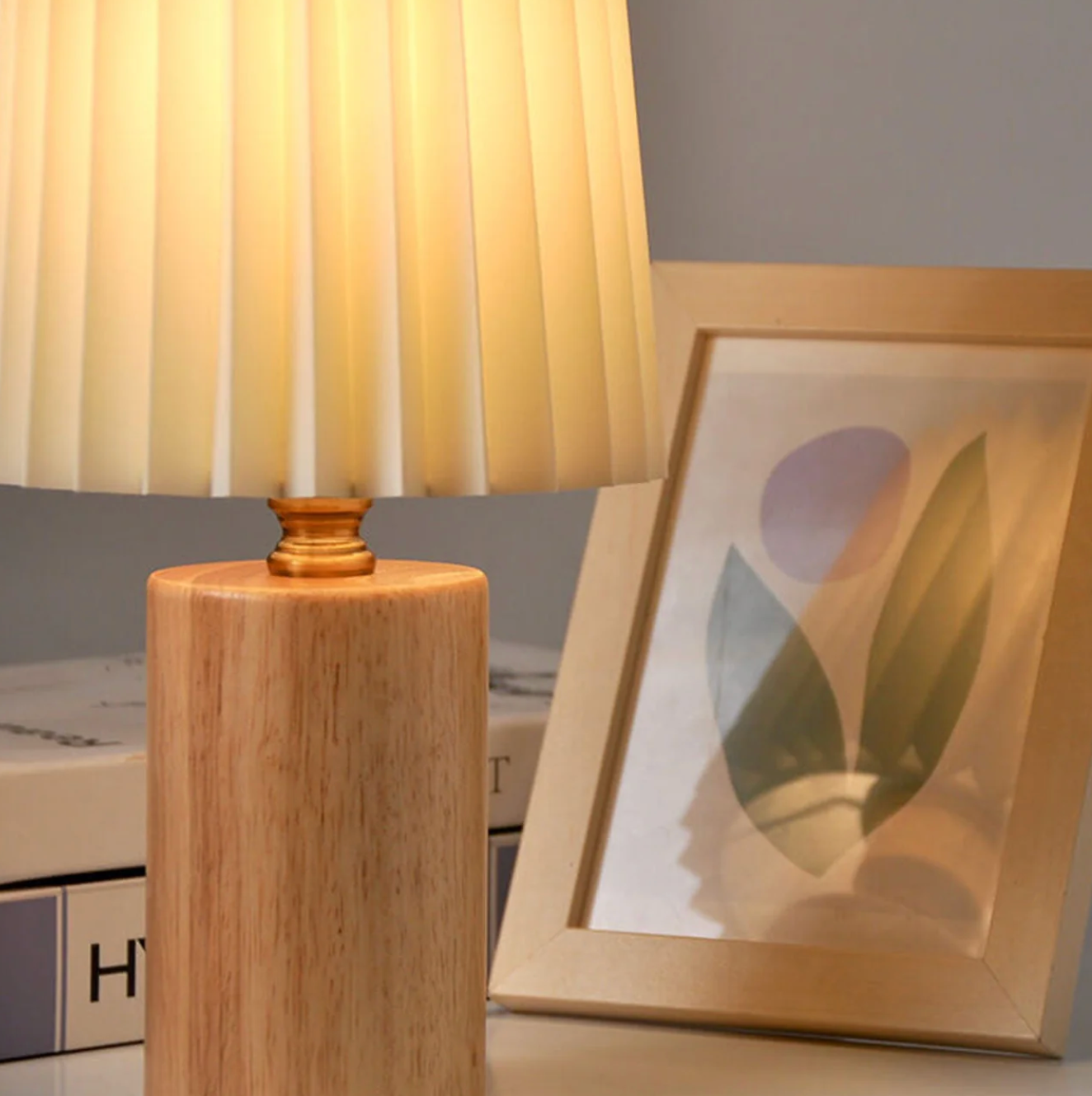 A modern table lamp with a wooden base and a pleated shade – a Scandinavian-style bedside lamp 6