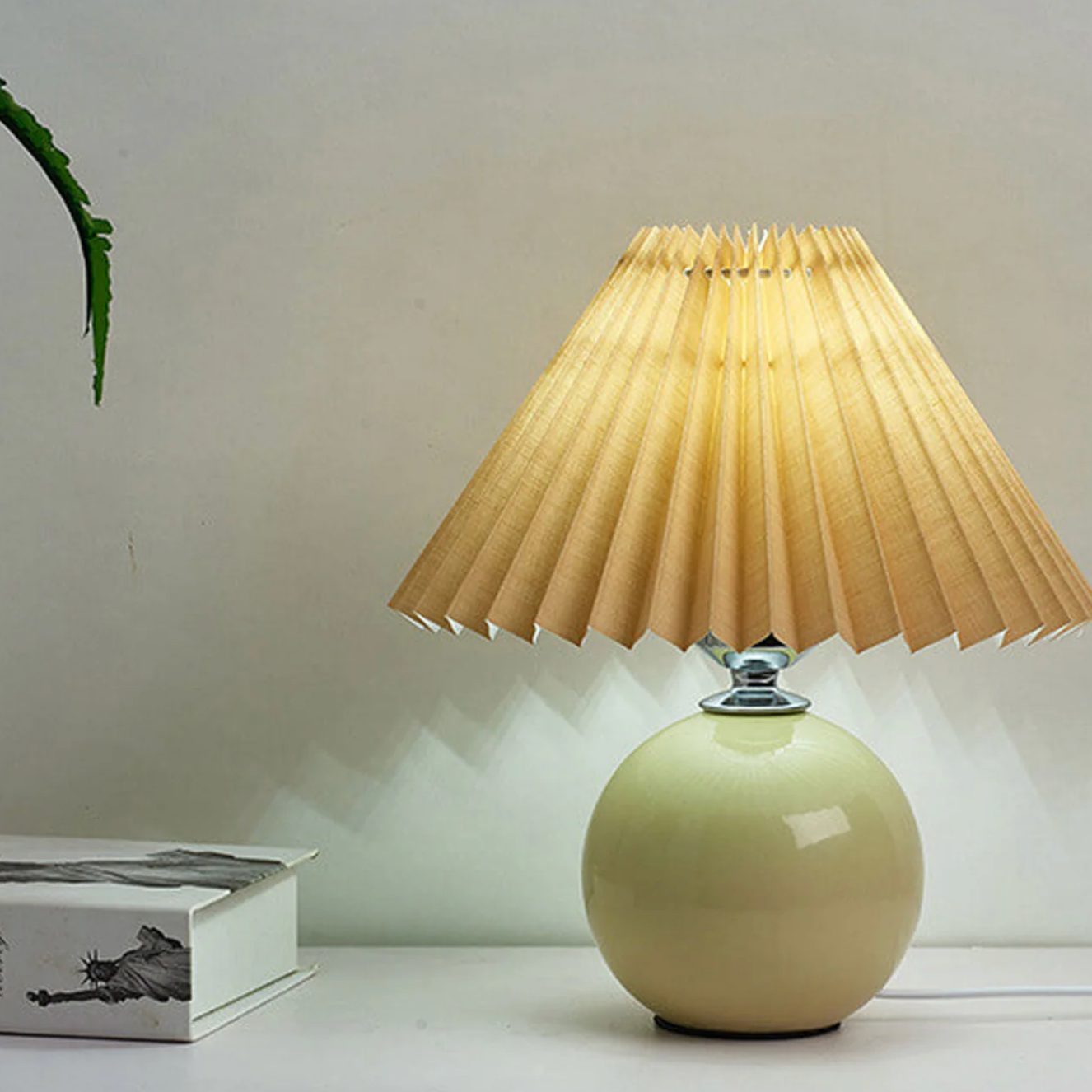 Table lamp with a pleated shade – a designer ball with a ceramic base 0