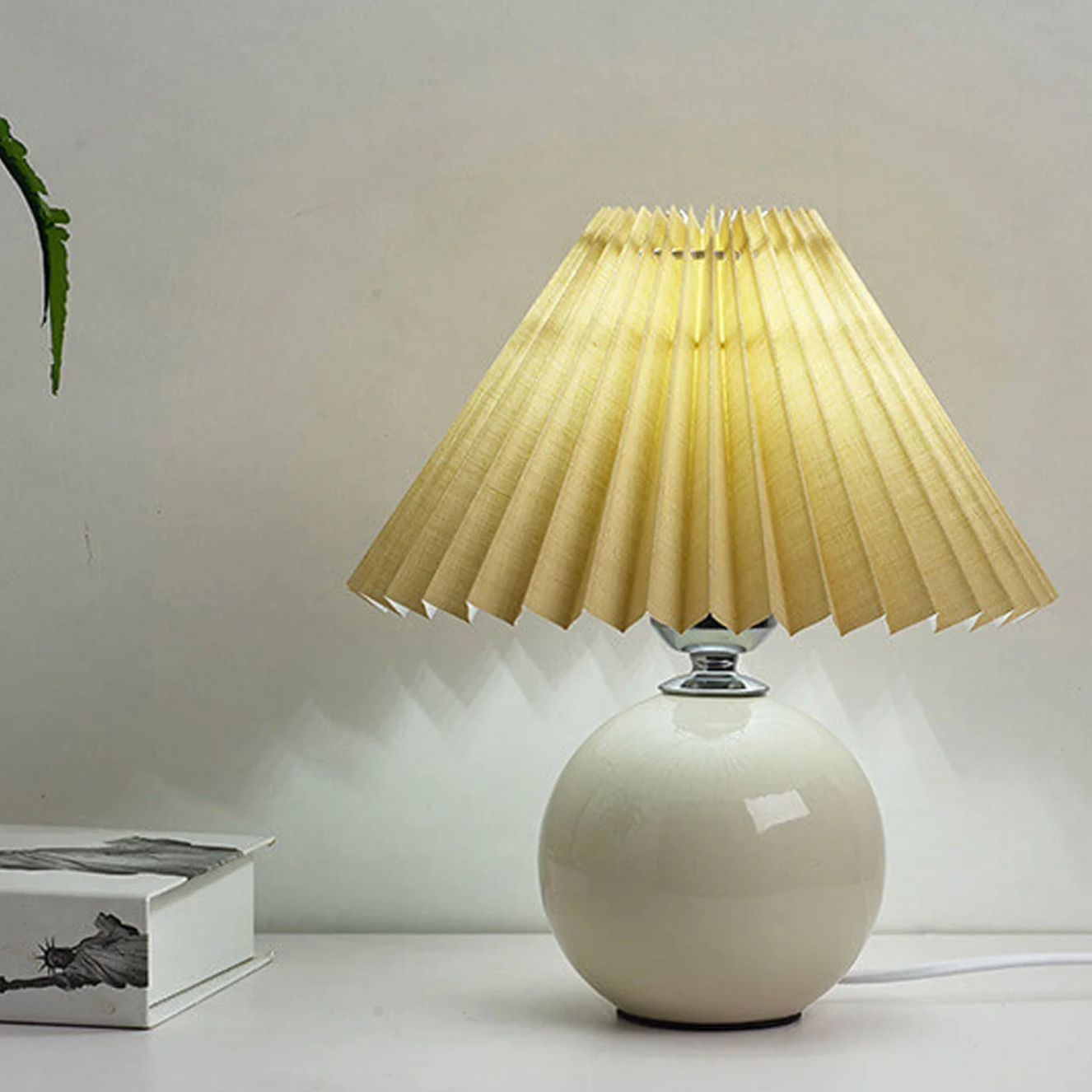 Table lamp with a pleated shade – a designer ball with a ceramic base 5