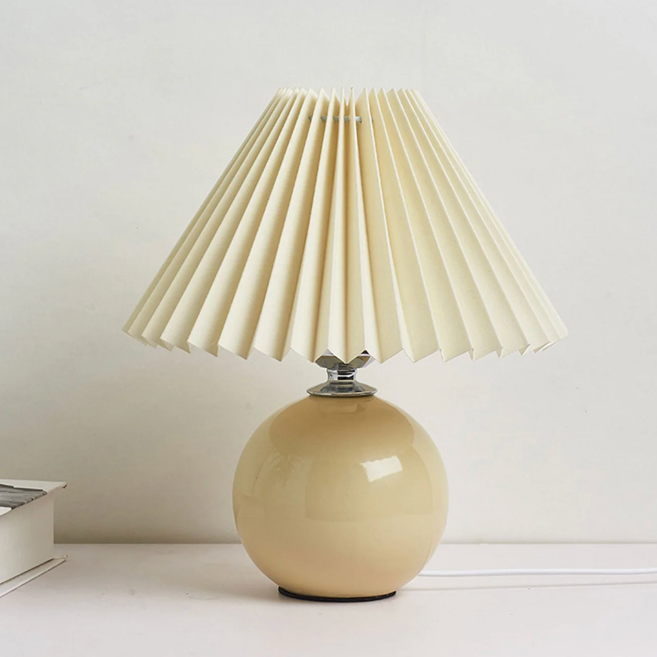 Table lamp with a pleated shade – a designer ball with a ceramic base 7