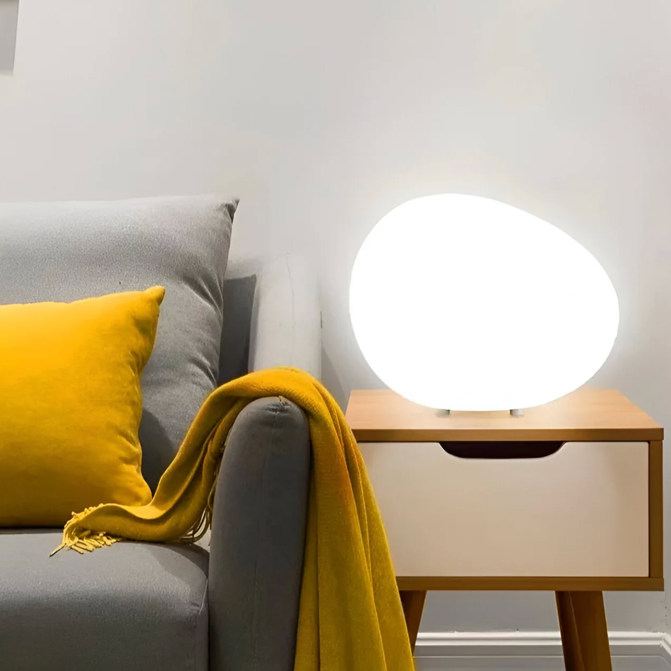 Stone-shaped table lamp – minimalist elegance in an organic form 1