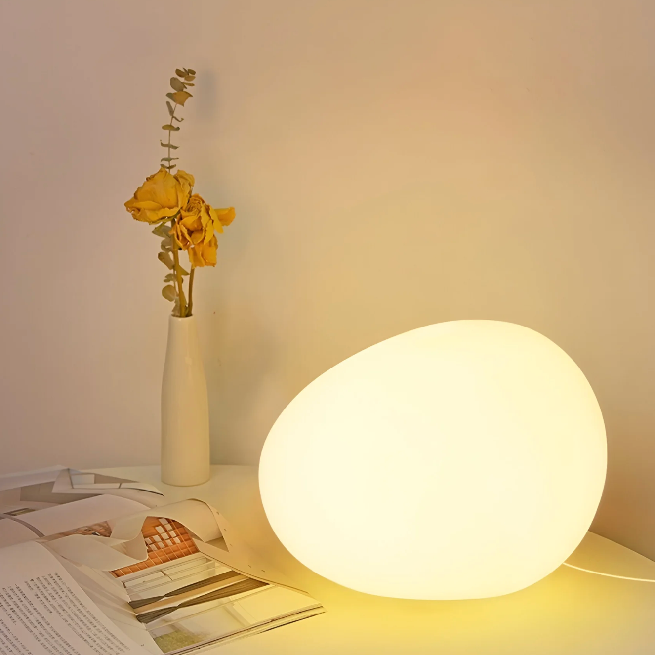Stone-shaped table lamp – minimalist elegance in an organic form 4