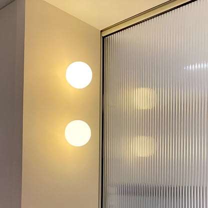 Elara Haus Round Glass Sconce