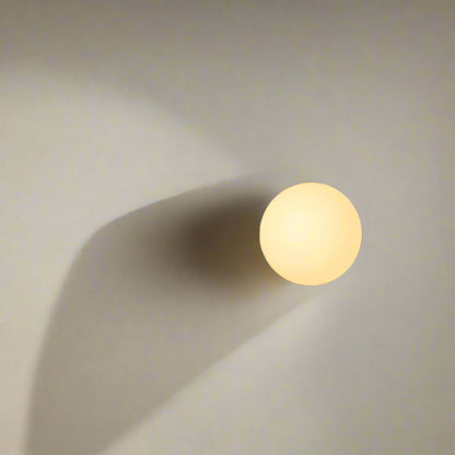 Elara Haus Round Glass Sconce