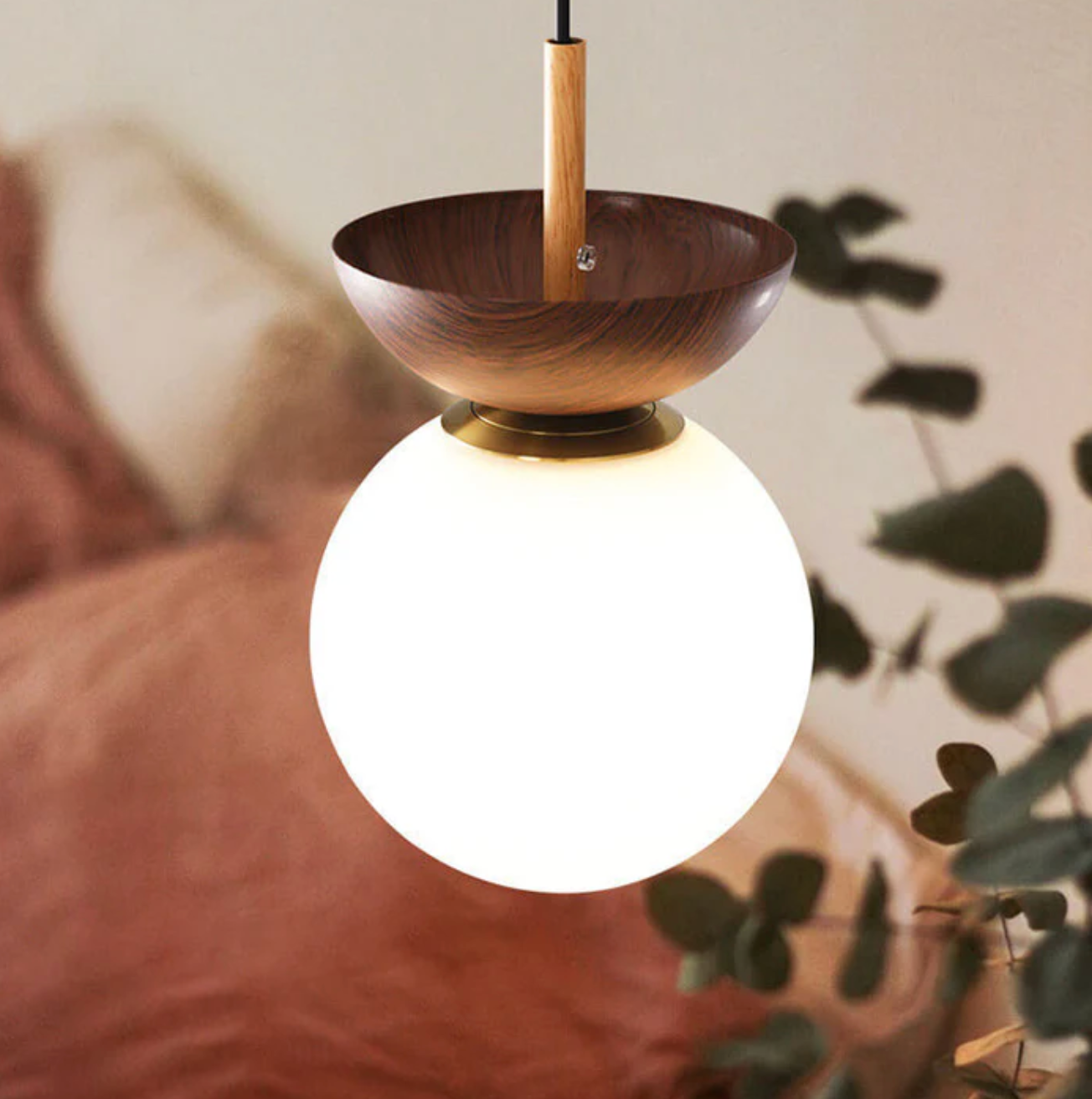 A ceiling or pendant lamp with a frosted shade and a wooden accent – minimalist elegance for any interior 6