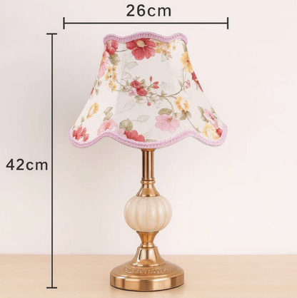 A classic table lamp with a decorative lampshade – an elegant bedside lamp in a retro style. 4