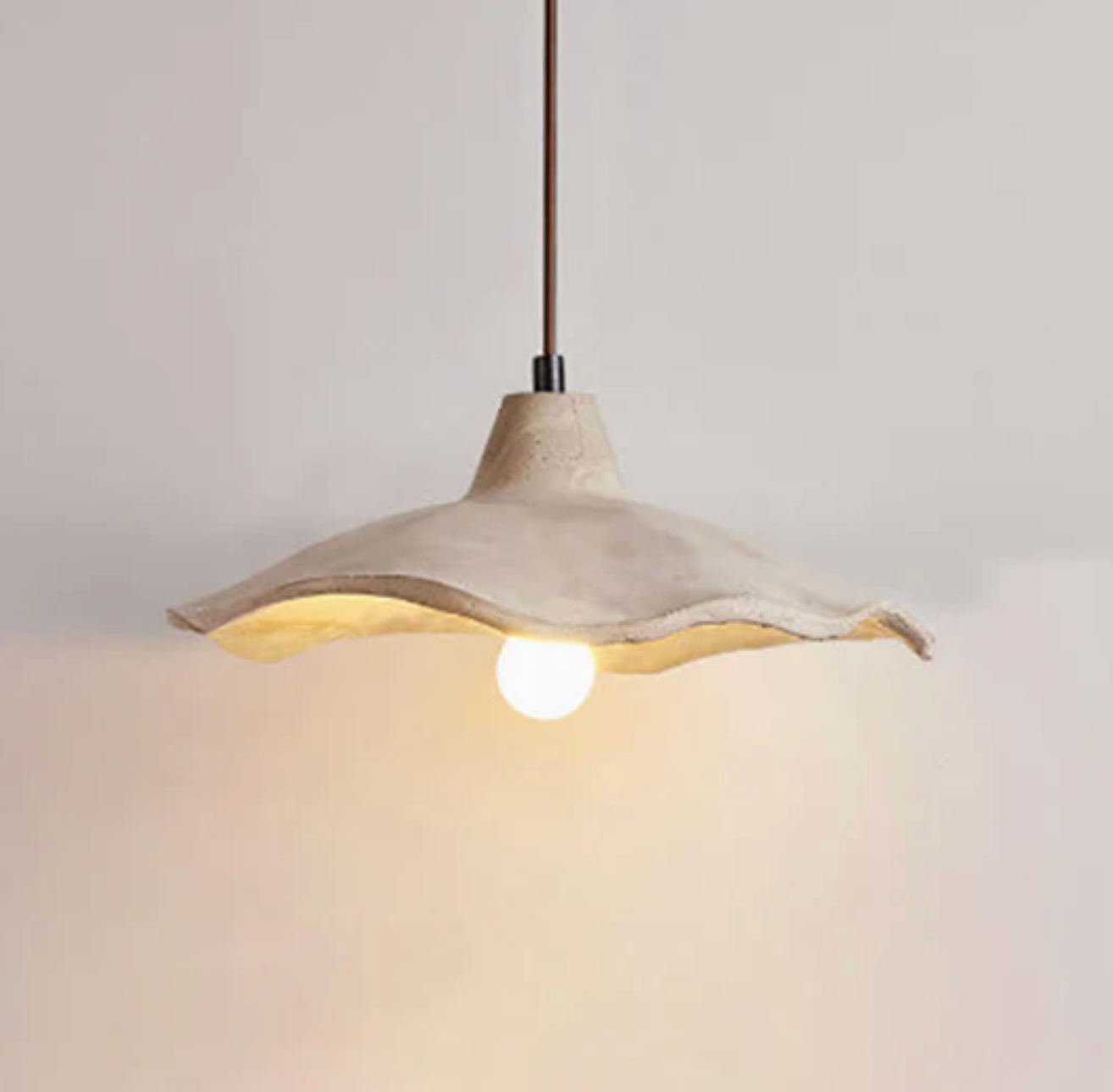 A designer pendant lamp with a concrete shade – an organic form and natural character 1