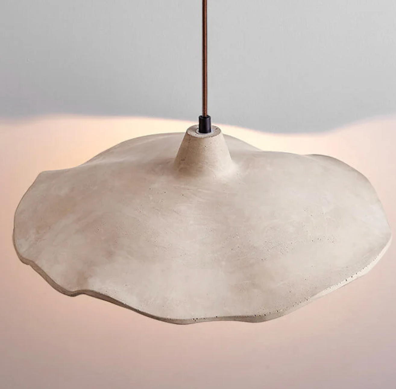 A designer pendant lamp with a concrete shade – an organic form and natural character 2